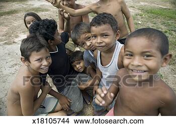 Stock Photo - group of children 
(3-4),  (6-7) 
on village road, 
 portrait,  elevated. 
fotosearch - search 
stock photos, 
pictures, images, 
and photo clipart
