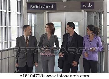 Stock Photo - two young women 
walking with a 
young man and 
a mature man. 
fotosearch - search 
stock photos, 
pictures, images, 
and photo clipart