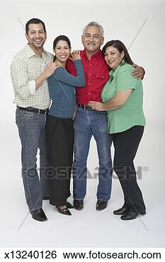 Stock Photo - portrait of a 
mature couple 
standing with 
a mid adult couple. 
fotosearch - search 
stock photos, 
pictures, images, 
and photo clipart