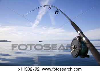 Stock Photo - salmon fishing 
rod bending. fotosearch 
- search stock 
photos, pictures, 
images, and photo 
clipart