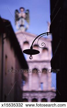 Stock Photo - tuscany, italy 
- streetlight 
jutting out from 
build. fotosearch 
- search stock 
photos, pictures, 
images, and photo 
clipart