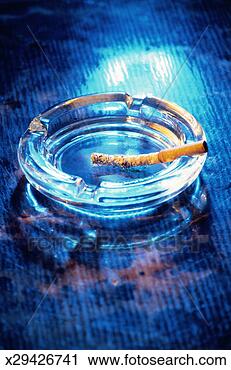 Stock Photography - cigarette with 
long ash. fotosearch 
- search stock 
photos, pictures, 
images, and photo 
clipart