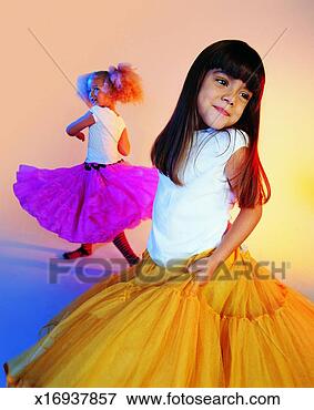 Picture - portrait of a 
young girl with 
long,  brown hair 
with another girl. 
fotosearch - search 
stock photos, 
pictures, images, 
and photo clipart