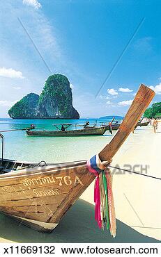 Stock Photo - daylight, asia, 
coast, boat, beach, 
ao phra nang. 
fotosearch - search 
stock photos, 
pictures, images, 
and photo clipart