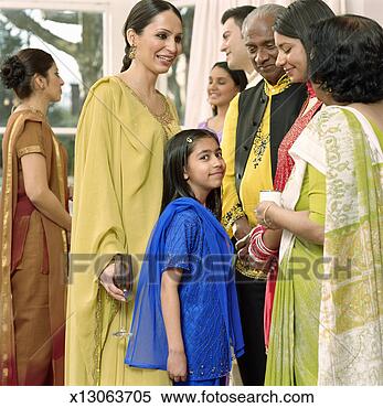 Stock Image - three generational 
family wearing 
traditional indian 
clothing,  girl. 
fotosearch - search 
stock photos, 
pictures, images, 
and photo clipart