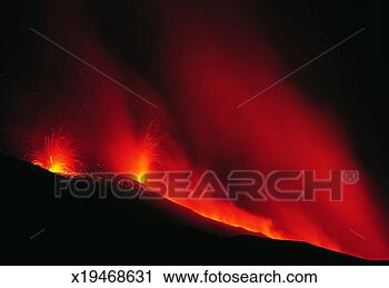 Stock Photography - lava flowing from 
a volcanic eruption 
on mt etna, sicily, 
italy. fotosearch 
- search stock 
photos, pictures, 
images, and photo 
clipart