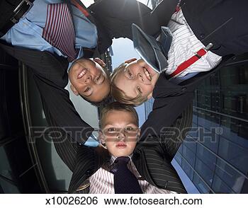 Stock Photo - view directly 
below of three 
young boys dressed 
as businessmen. 
fotosearch - search 
stock photos, 
pictures, images, 
and photo clipart
