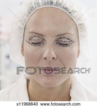 Stock Photography - portrait of a 
woman with guide 
markings around 
her eyes in. fotosearch 
- search stock 
photos, pictures, 
images, and photo 
clipart