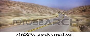 Stock Photography - zoom-in on a curving 
road, california, 
usa. fotosearch 
- search stock 
photos, pictures, 
images, and photo 
clipart
