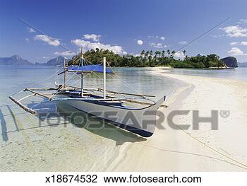 Stock Photo - boat moored on 
a deserted beach, 
palawan, philippines, 
asia. fotosearch 
- search stock 
photos, pictures, 
images, and photo 
clipart