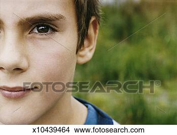 Stock Photo - close-up cropped 
portrait of a 
young boy. fotosearch 
- search stock 
photos, pictures, 
images, and photo 
clipart