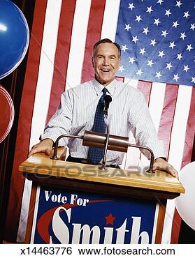 Stock Photo - american politican 
giving a speech 
from behind a 
podium during 
a. fotosearch 
- search stock 
photos, pictures, 
images, and photo 
clipart