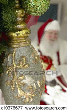 Picture - close up of a 
christmas decoration 
and father christmas 
in the. fotosearch 
- search stock 
photos, pictures, 
images, and photo 
clipart