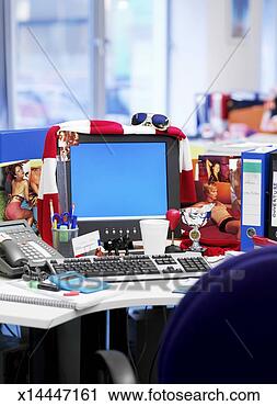 Stock Photography - office desk covered 
in a large group 
of objects. fotosearch 
- search stock 
photos, pictures, 
images, and photo 
clipart
