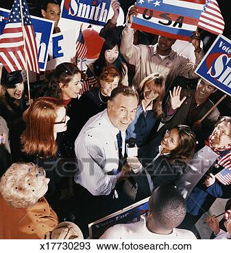 Stock Photo - politician being 
interviewed in 
the middle of 
a large crowd 
during a. fotosearch 
- search stock 
photos, pictures, 
images, and photo 
clipart