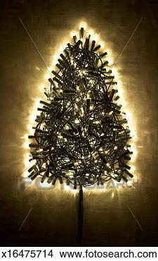 Stock Photo - illuminated christmas 
lights in the 
shape of a christmas 
tree. fotosearch 
- search stock 
photos, pictures, 
images, and photo 
clipart
