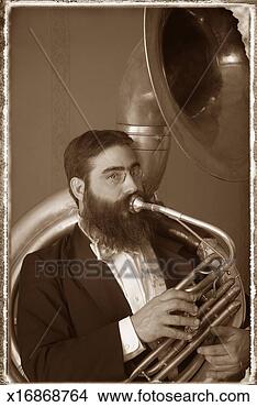 Stock Photo - old fashioned 
portrait of a 
male tuba player. 
fotosearch - search 
stock photos, 
pictures, images, 
and photo clipart