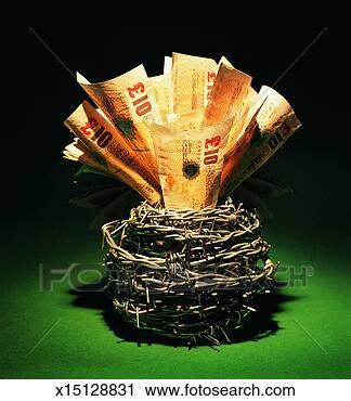 Stock Photography - banknotes in a 
birds nest made 
of barbed wire. 
fotosearch - search 
stock photos, 
pictures, images, 
and photo clipart
