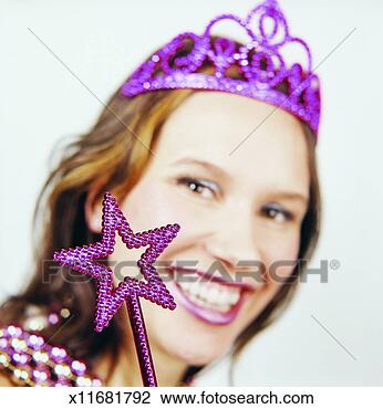 Stock Photo - headshot of a 
woman dressed 
as a princess 
and holding a 
wand. fotosearch 
- search stock 
photos, pictures, 
images, and photo 
clipart