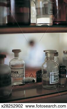 Stock Photo - old fashioned 
bottles of chemicals 
on a shelf. fotosearch 
- search stock 
photos, pictures, 
images, and photo 
clipart