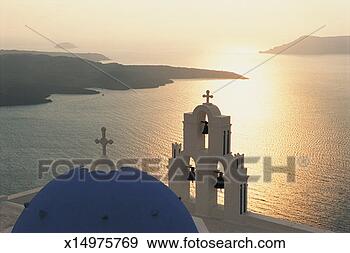 Stock Photograph - church dome and 
belltower with 
a view of the 
coast at dusk. 
fotosearch - search 
stock photos, 
pictures, images, 
and photo clipart