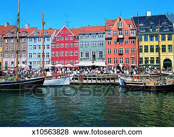 Stock Photo - large group of 
people at the 
houses at nyhavn 
harbour,  copenhagen. 
fotosearch - search 
stock photos, 
pictures, images, 
and photo clipart