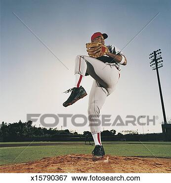 Picture - baseball pitcher 
stands on one 
leg in preparation 
to throw. fotosearch 
- search stock 
photos, pictures, 
images, and photo 
clipart