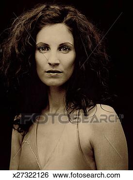 Stock Photo - sepia portrait 
of a woman with 
curly hair. fotosearch 
- search stock 
photos, pictures, 
images, and photo 
clipart