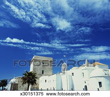 Stock Image - spain, andalucia, 
cadiz, cadiz cathedral, 
low angle view. 
fotosearch - search 
stock photos, 
pictures, images, 
and photo clipart