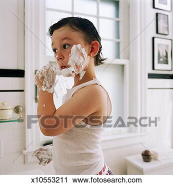 Stock Photography - boy (3-5) with 
shaving cream 
on face and hands, 
in bathroom. fotosearch 
- search stock 
photos, pictures, 
images, and photo 
clipart