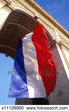 Stock Photography - france, paris, 
arc de triomphe 
and french flag, 
low angle view. 
fotosearch - search 
stock photos, 
pictures, images, 
and photo clipart