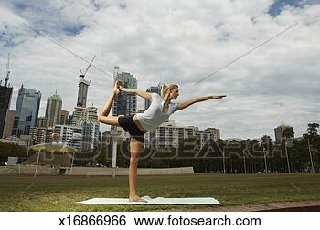 Stock Photo - young woman performing 
shiva posture. 
fotosearch - search 
stock photos, 
pictures, images, 
and photo clipart