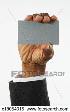 Stock Image - businessman holding 
business card 
(focus on business 
card). fotosearch 
- search stock 
photos, pictures, 
images, and photo 
clipart