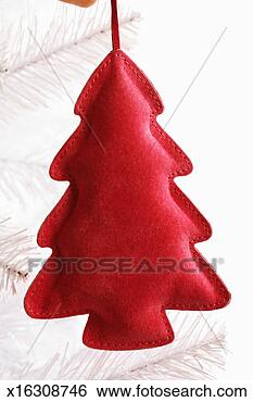 Stock Photo - felt christmas 
tree-shaped decoration 
on christmas tree, 
close up. fotosearch 
- search stock 
photos, pictures, 
images, and photo 
clipart