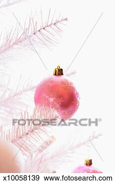 Stock Photograph - pink christmas 
bauble decoration 
on christmas tree, 
close up. fotosearch 
- search stock 
photos, pictures, 
images, and photo 
clipart