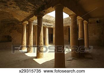 Stock Image - cyprus, paphos, 
tombs of the kings, 
sunlight in courtyard. 
fotosearch - search 
stock photos, 
pictures, images, 
and photo clipart