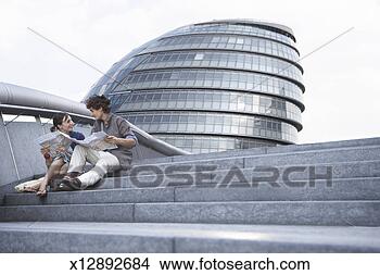 Stock Photo - england, london, 
city hall, couple 
sitting on steps. 
fotosearch - search 
stock photos, 
pictures, images, 
and photo clipart