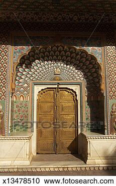 Stock Photography - india, jaipur, 
city palace, peacock 
gate decorated 
arch door surround. 
fotosearch - search 
stock photos, 
pictures, images, 
and photo clipart