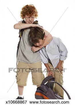 Picture - boy (6-8) being 
bullied by older 
boy (9-11). fotosearch 
- search stock 
photos, pictures, 
images, and photo 
clipart