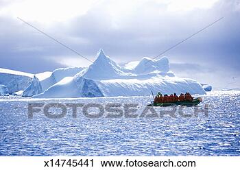 Stock Photography - 'ecological tourists 
in inflatable 
zodiac boat in 
errera channel 
at. fotosearch 
- search stock 
photos, pictures, 
images, and photo 
clipart