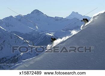 Stock Photograph - france, alps, 
serre chevalier, 
one man skiing, 
one man snowboarding. 
fotosearch - search 
stock photos, 
pictures, images, 
and photo clipart