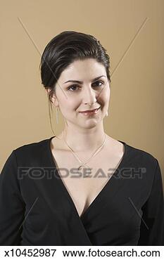 Picture - mid adult woman 
smiling, portrait. 
fotosearch - search 
stock photos, 
pictures, images, 
and photo clipart