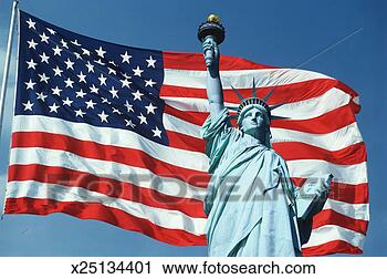 Stock Photography - this is an american 
flag on a flagpole 
waving in the 
wind set against. 
fotosearch - search 
stock photos, 
pictures, images, 
and photo clipart