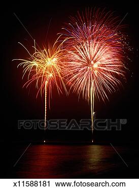 Stock Photography - fireworks above 
the ocean. fotosearch 
- search stock 
photos, pictures, 
images, and photo 
clipart