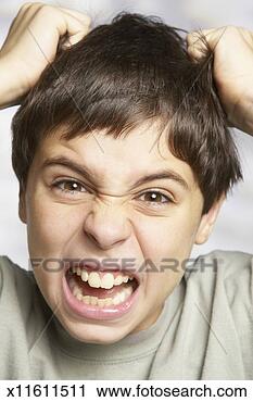 Stock Photography - boy (10-11 years) 
pulling out hair, 
close up, portrait. 
fotosearch - search 
stock photos, 
pictures, images, 
and photo clipart