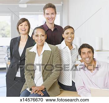 Stock Photography - five business 
people posing 
in office, portrait. 
fotosearch - search 
stock photos, 
pictures, images, 
and photo clipart