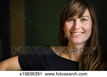 Stock Photography - portrait of mid 
adult woman smiling. 
fotosearch - search 
stock photos, 
pictures, images, 
and photo clipart