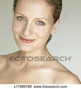 Stock Photograph - portrait of woman, 
head and shoulders. 
fotosearch - search 
stock photos, 
pictures, images, 
and photo clipart