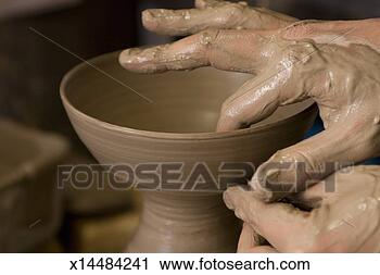 Stock Photography - potter making 
japanese bowl, 
close-up of hands. 
fotosearch - search 
stock photos, 
pictures, images, 
and photo clipart