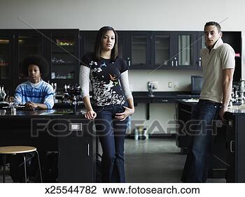 Stock Photo - three students 
(15-17) in classroom 
lab, portrait. 
fotosearch - search 
stock photos, 
pictures, images, 
and photo clipart